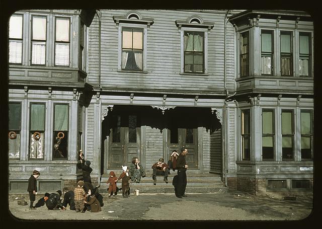 [Children with adult in the tenement district, Brockton, Massachusetts]