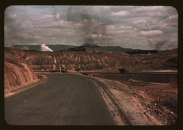 A train bringing copper ore out of the mine, Ducktown, Tenn. Fumes from smelting copper for sulfuric acid have destroyed