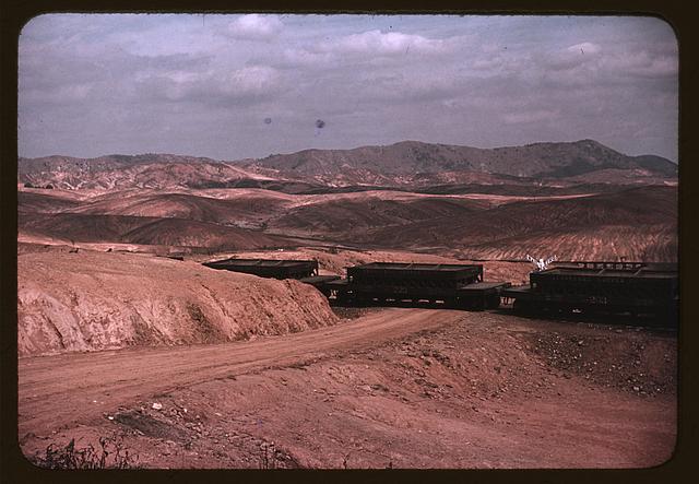 A train bringing copper ore out of the mine, Ducktown, Tenn. Fumes from smelting copper for sulfuric acid have destroyed