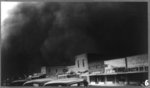 [Elkhart, Kansas. View of Main Street and approaching dust storm. May 21, 1937]